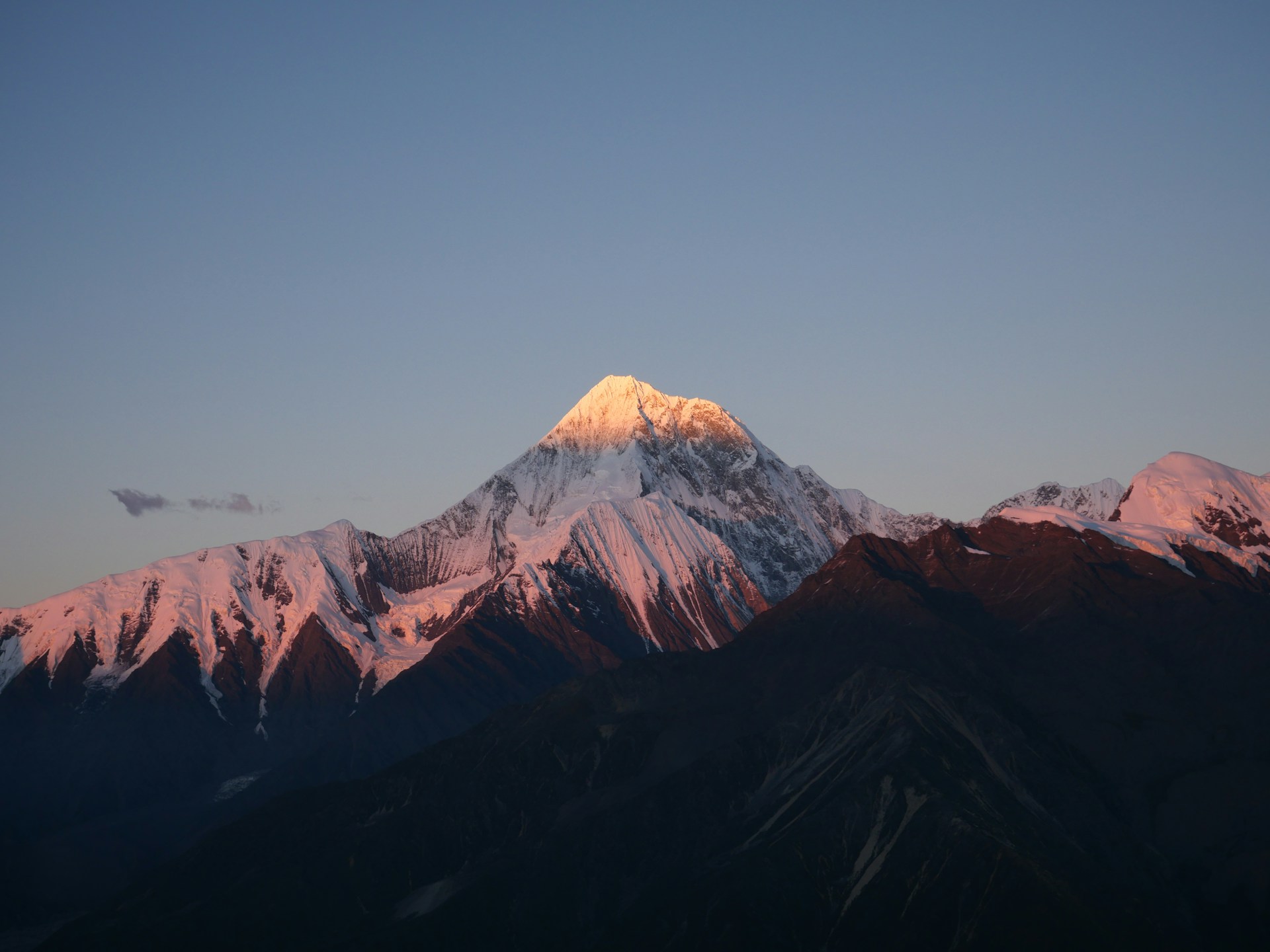Golden sunrise on Gongga Shan snow mountain in China